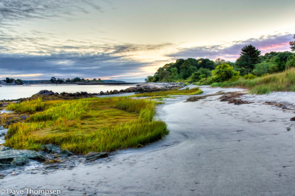 A photograph of early dawn on the sandy beach of Odiorne Point in Rye, NH.